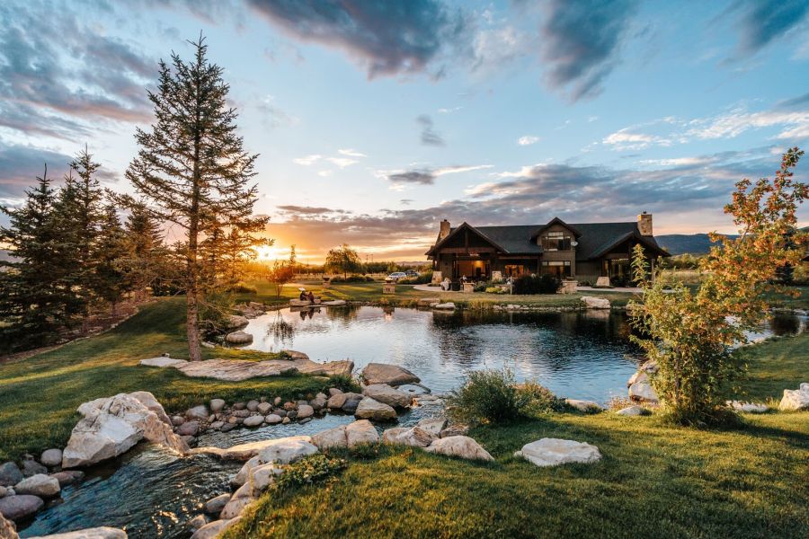 A sunset overlooking a waterfront cabin at the abode park city vacation rentals. A sunset overlooking a waterfront cabin at the abode park city vacation rentals. A sunset overlooking a waterfront cabin at the abode park city vacation rentals. A sunset overlooking a waterfront cabin at the abode park city vacation rentals.