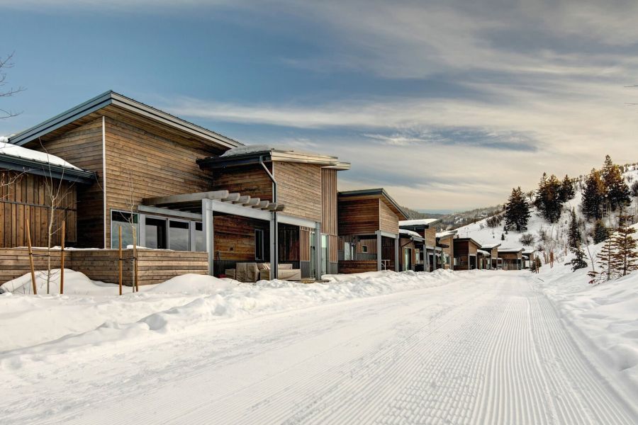 A Park City Ski vacation rental next to a beautiful snowy ski slope. A Park City Ski vacation rental next to a beautiful snowy ski slope. A Park City Ski vacation rental next to a beautiful snowy ski slope.