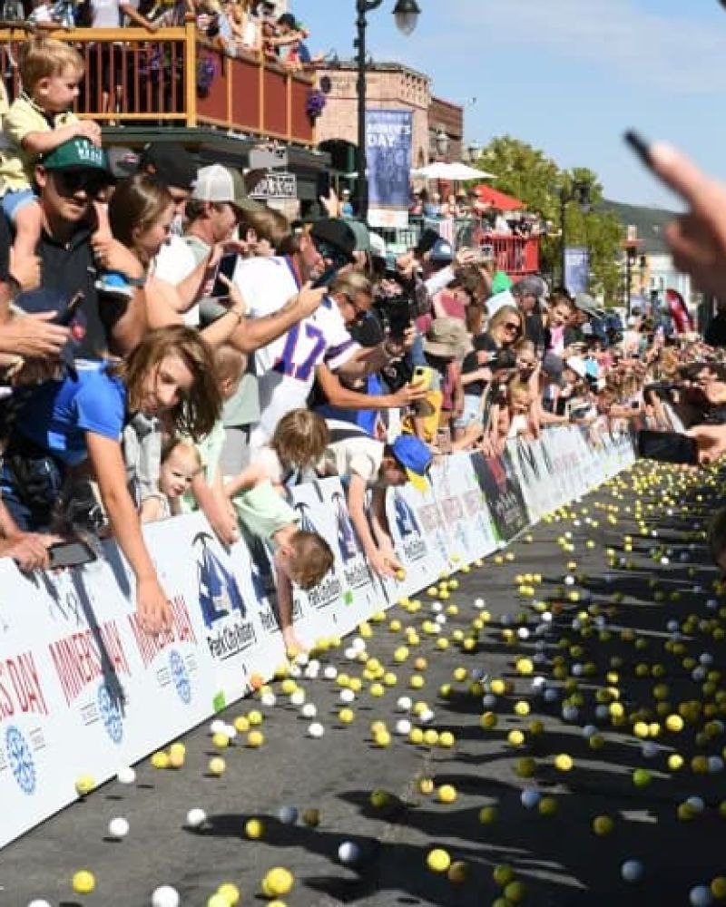 Crowd lining a Park City Rotary Miners Day ball drop on Main Street
